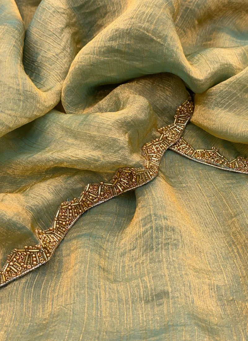 Amazing Teal Green Shaded Heavy Lace Border Silk Saree For Reception - Image 5