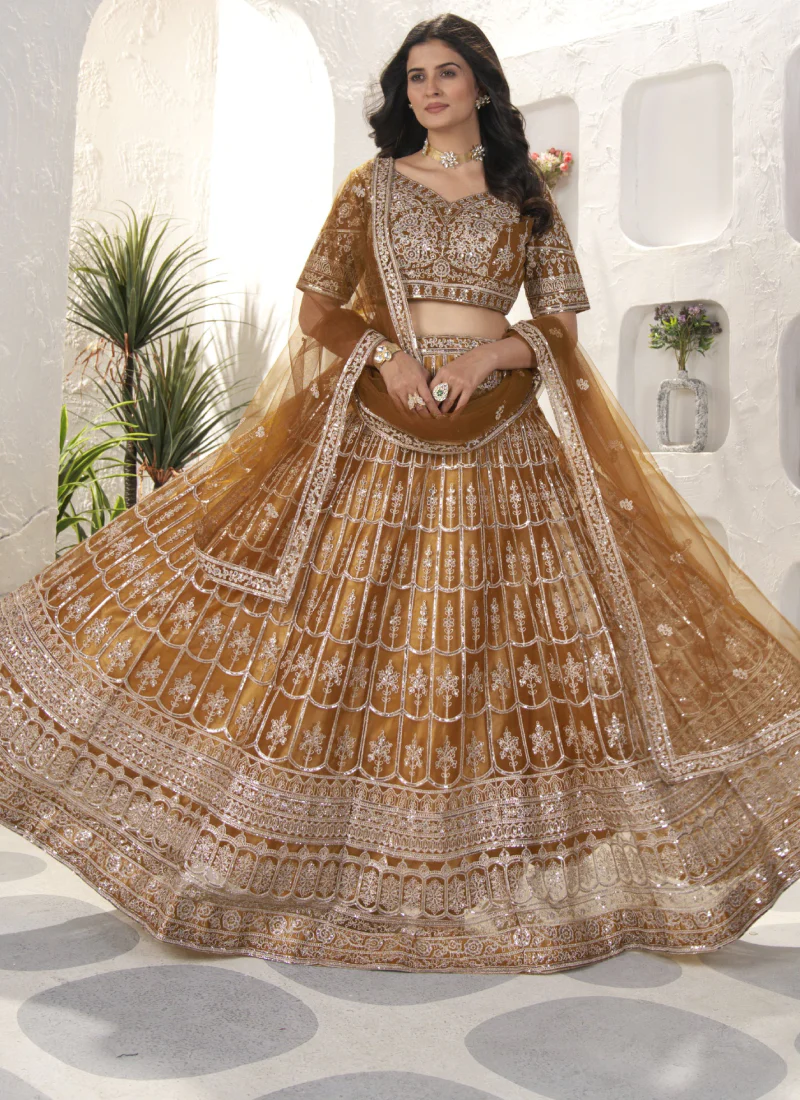 Attractive Sequence Embroidered Net Party Wear Golden Lehenga Choli - Image 3