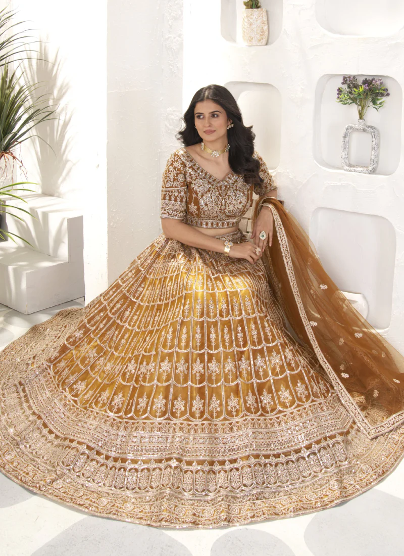 Attractive Sequence Embroidered Net Party Wear Golden Lehenga Choli - Image 4