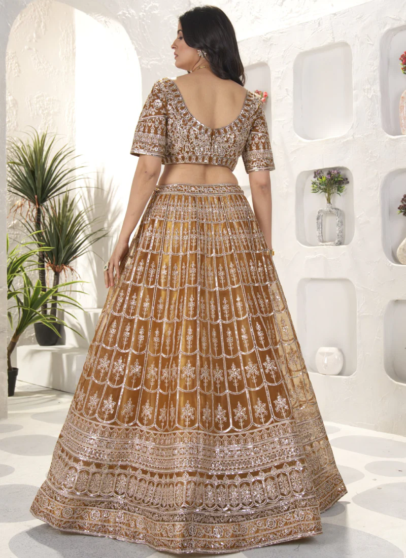 Attractive Sequence Embroidered Net Party Wear Golden Lehenga Choli - Image 5