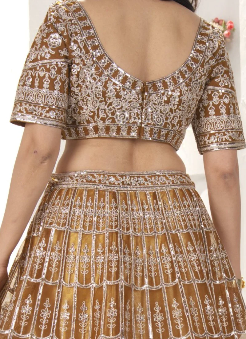 Attractive Sequence Embroidered Net Party Wear Golden Lehenga Choli - Image 6