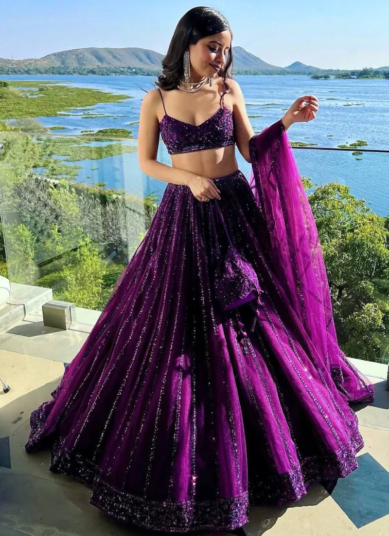 Beautiful Heavy Embroidered Reception Wear Purple Net Lehenga Choli - Image 4