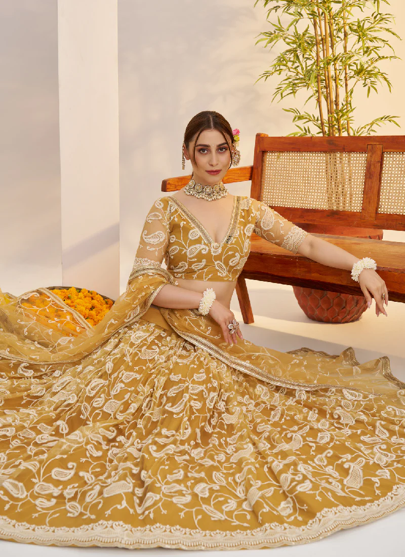 Bewitching Yellow Net Thread Embroidered Haldi Special Lehenga Choli - Image 5