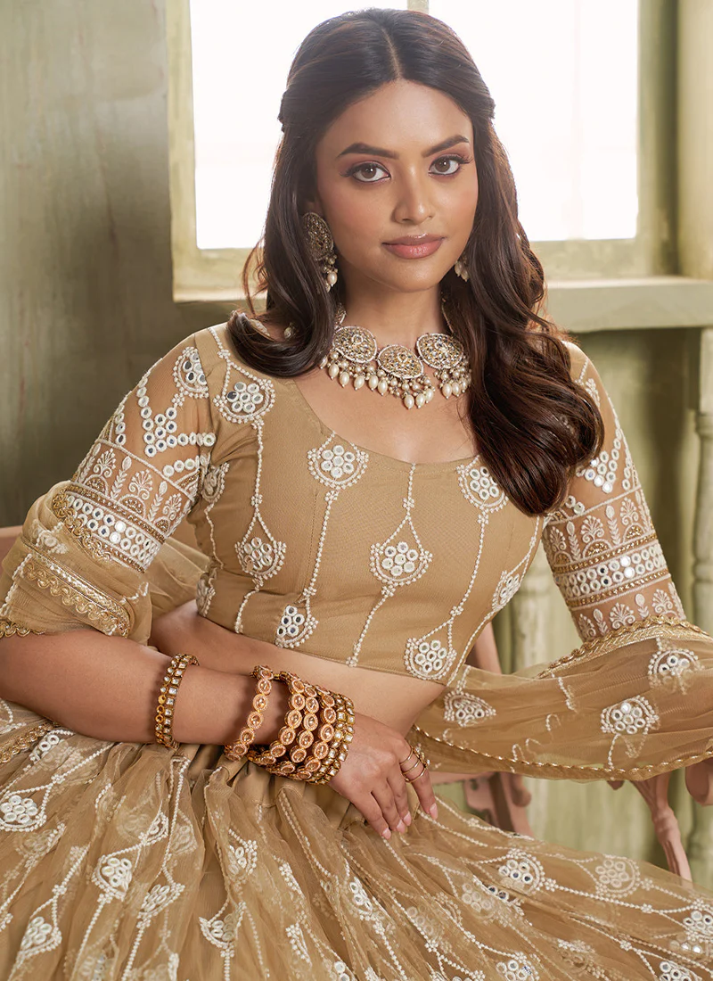 Fascinating Beige Net Thread Embroidered Lehenga Choli With Dupatta - Image 2