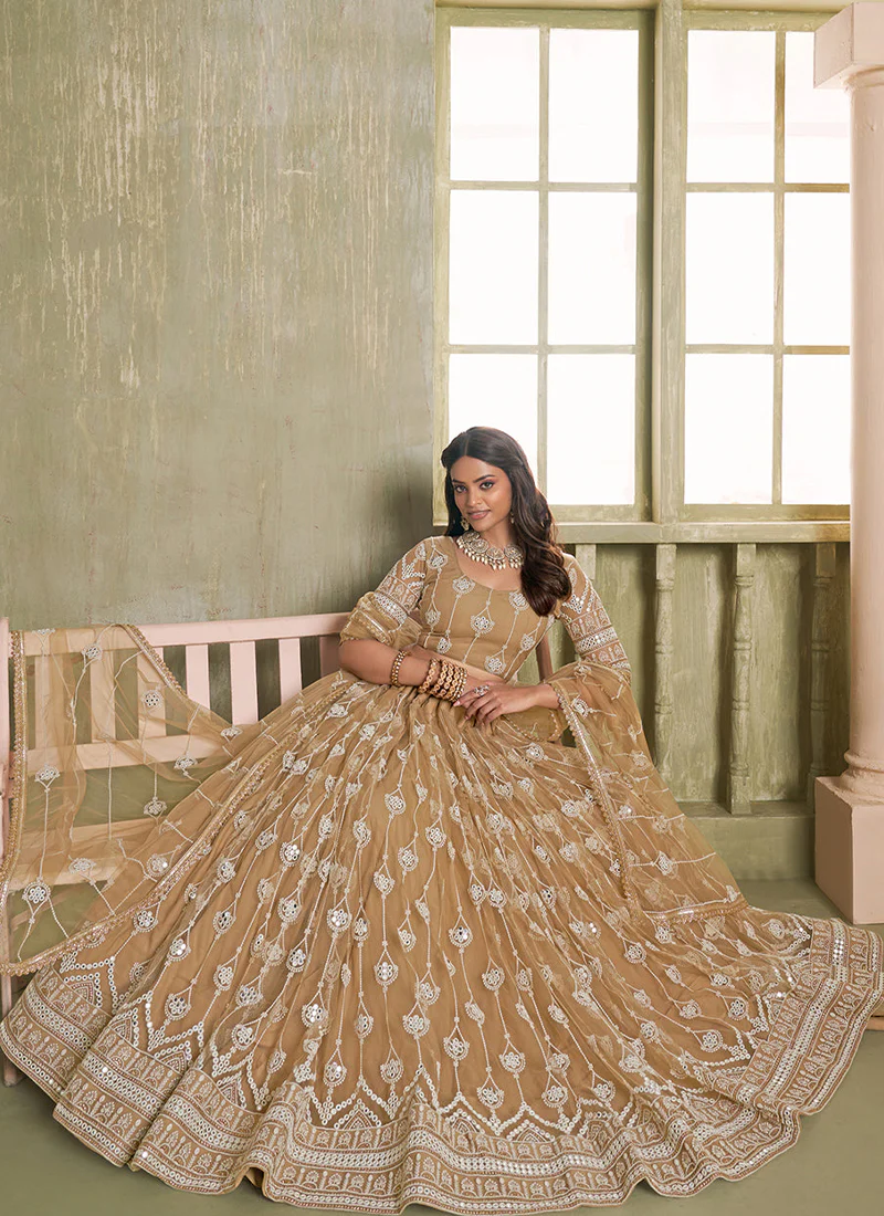 Fascinating Beige Net Thread Embroidered Lehenga Choli With Dupatta - Image 4