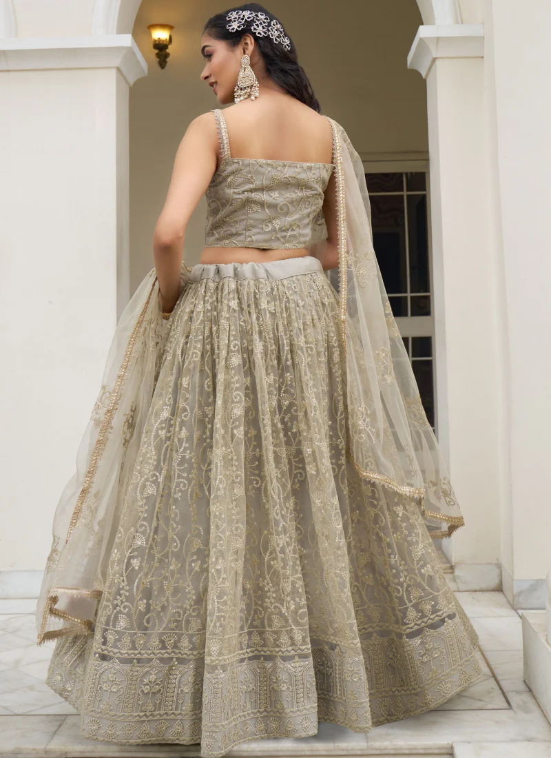 Fascinating Sequence Work Net Ivory Lehenga Choli For Reception Wear - Image 3