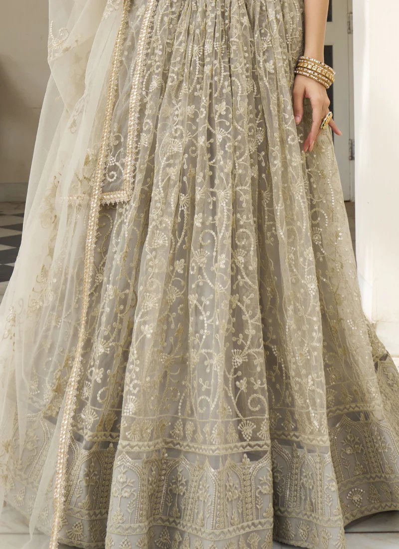 Fascinating Sequence Work Net Ivory Lehenga Choli For Reception Wear - Image 5