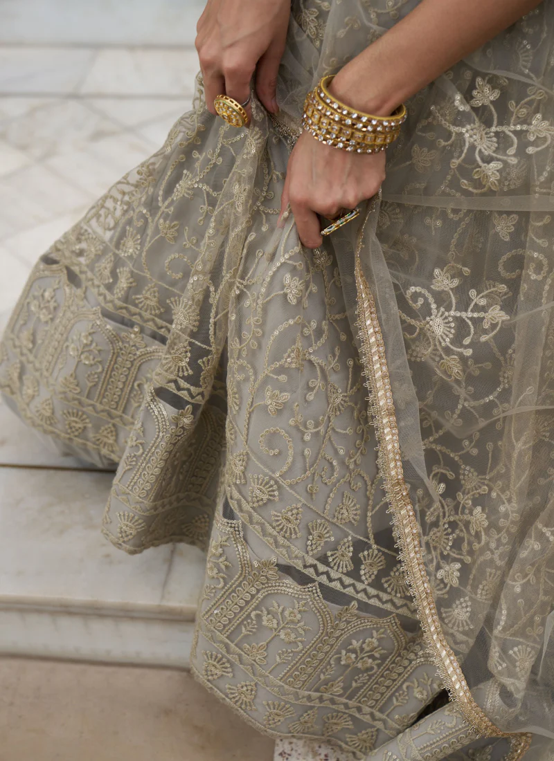 Fascinating Sequence Work Net Ivory Lehenga Choli For Reception Wear - Image 6