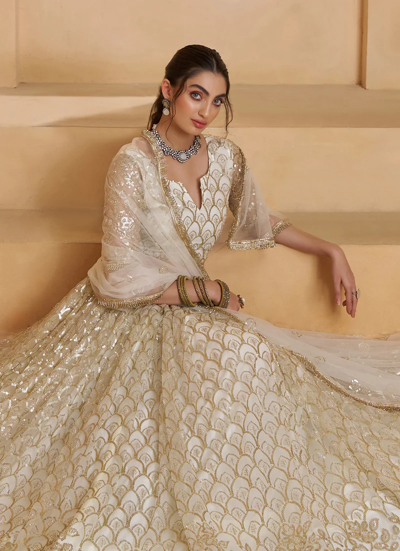 Heavy Sequence Embroidered Off White Wedding Wear Net Lehenga Choli - Image 3