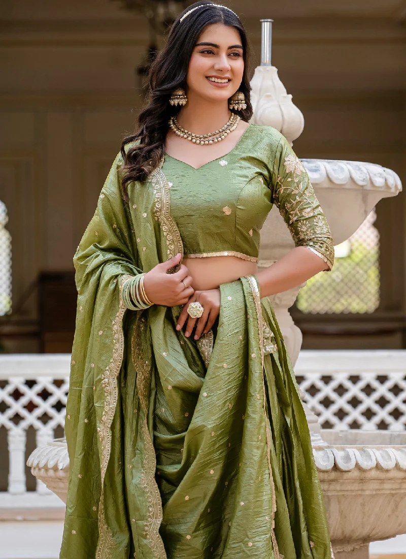 Latest Mehndi Green Color Gold Crush Heavy Zari Embroidered Lehenga Choli - Image 2