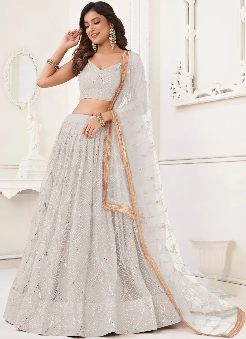 Latest Thread Embroidery Net Party Wear White Lehenga Choli - Image 2