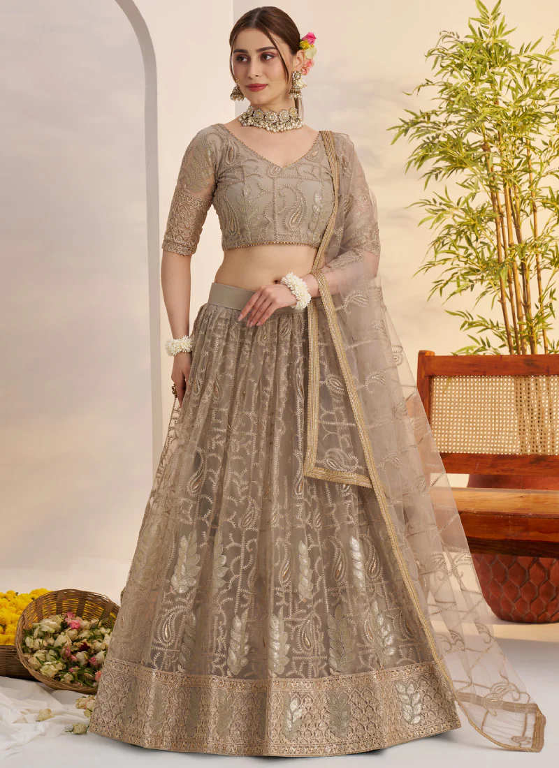 Prettiest Sequence Embroidered Cream Net Wedding Wear Lehenga Choli - Image 3