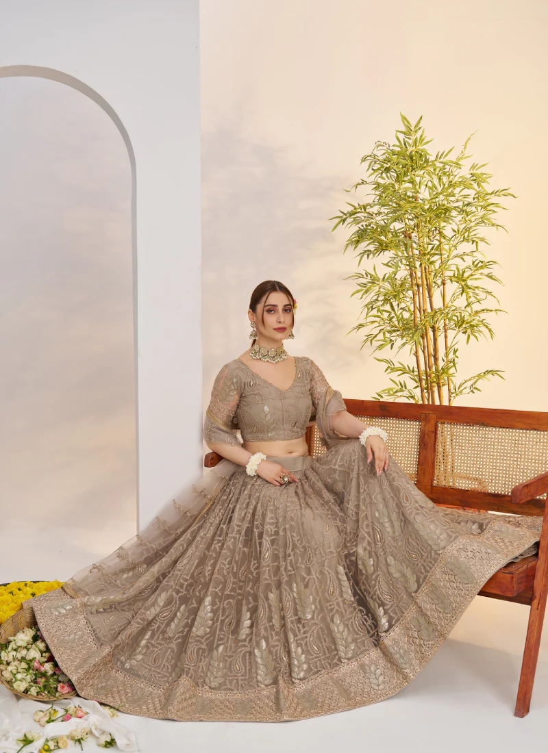 Prettiest Sequence Embroidered Cream Net Wedding Wear Lehenga Choli - Image 4