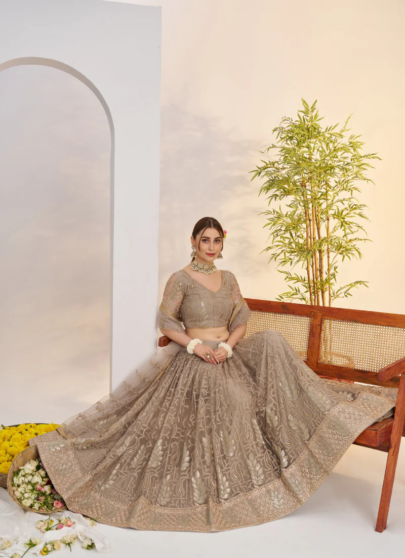 Prettiest Sequence Embroidered Cream Net Wedding Wear Lehenga Choli - Image 5
