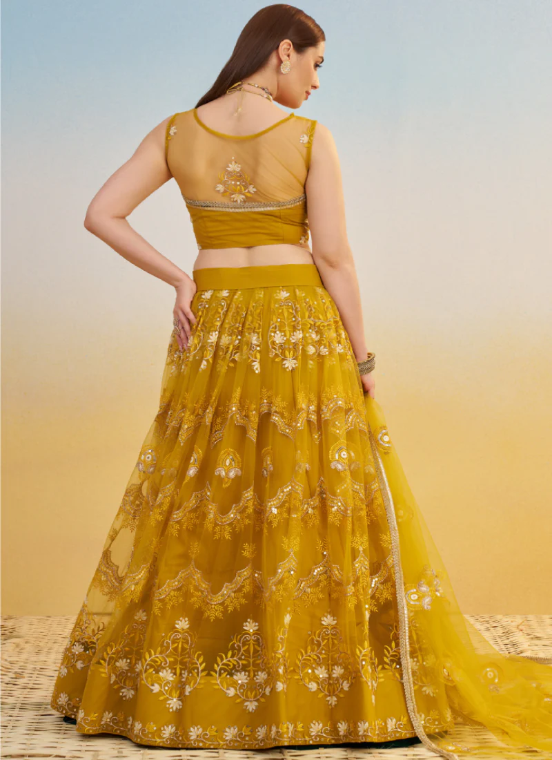 Pretty Net Thread Embroidered Mustard Yellow Haldi Wear Lehenga Choli - Image 7