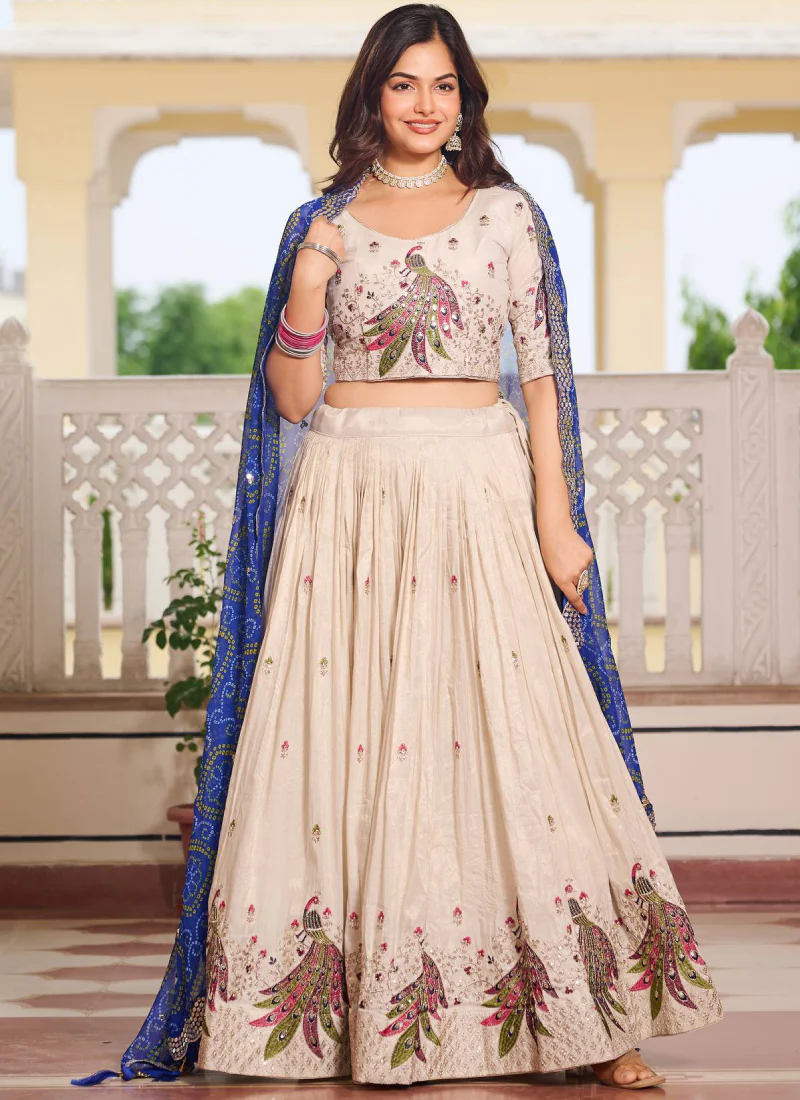 Pure Tissue Silk Multi Thread Embroidered Cream Lehenga Choli For Women - Image 2