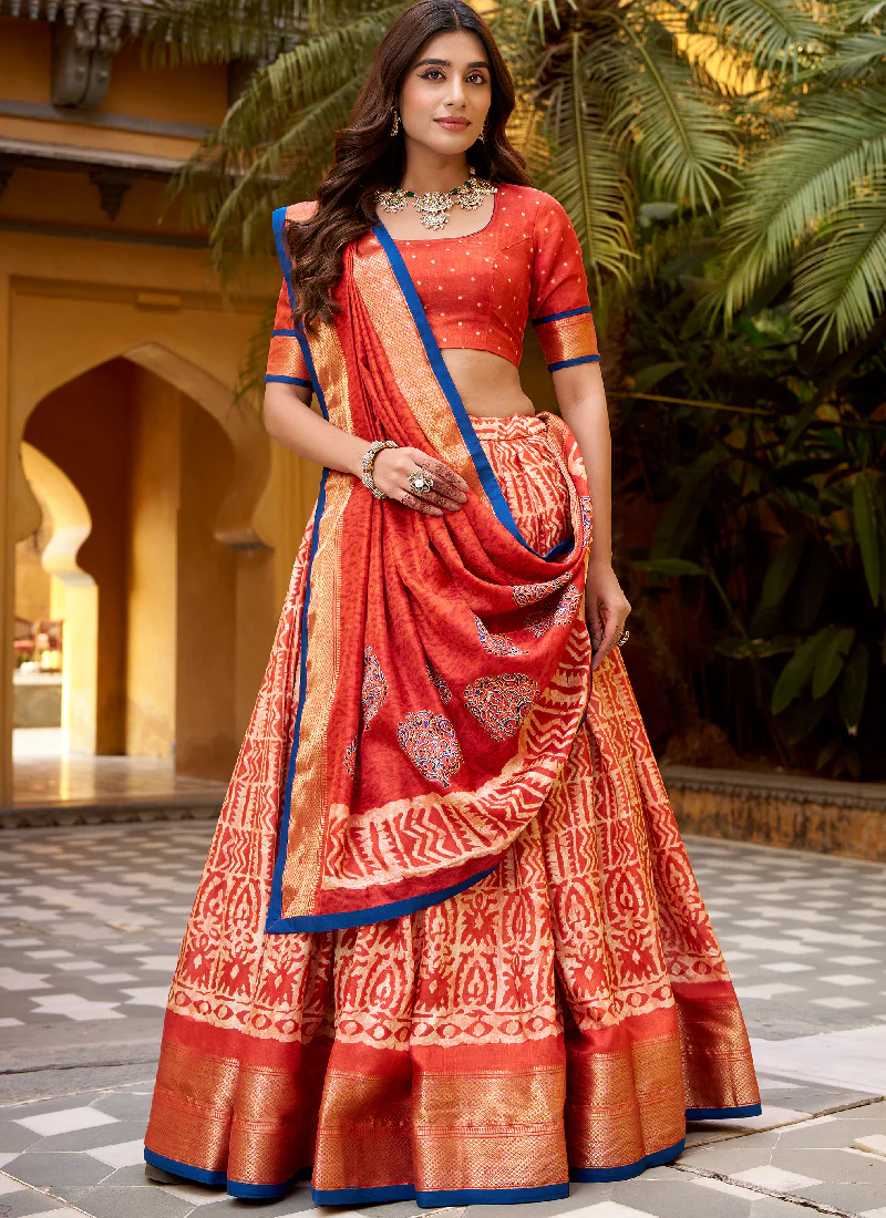 Rust Orange Batik Print With Zari Weaving Work Dola Silk Lehenga Choli