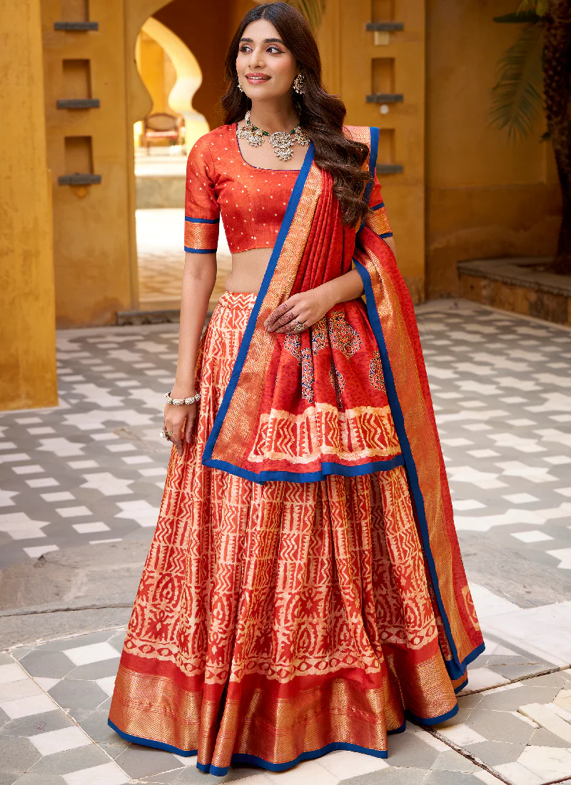 Rust Orange Batik Print With Zari Weaving Work Dola Silk Lehenga Choli - Image 3