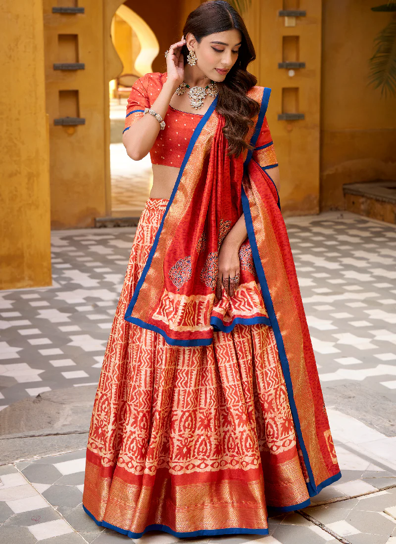 Rust Orange Batik Print With Zari Weaving Work Dola Silk Lehenga Choli - Image 4